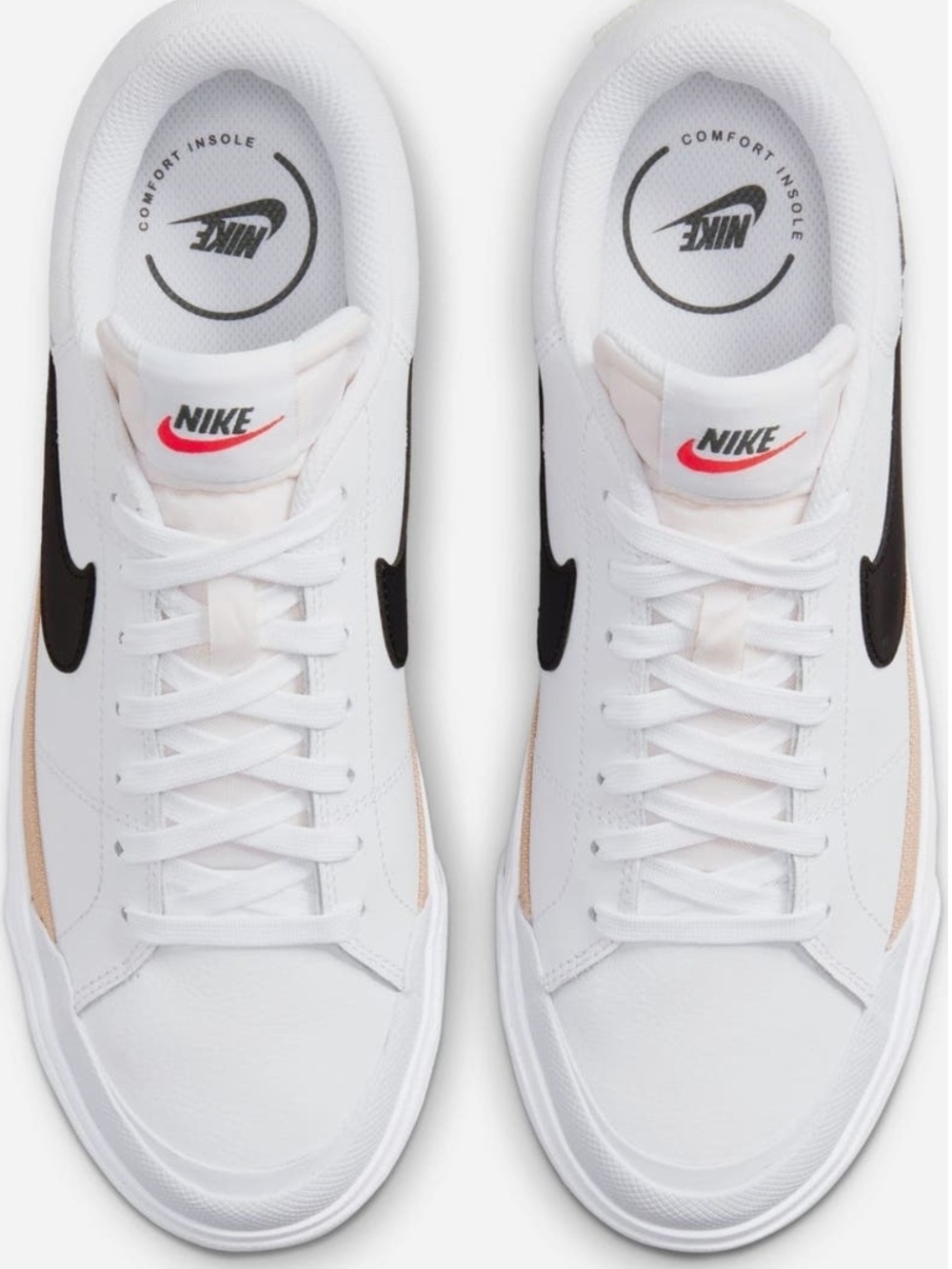 Nike White Low-Top Sneakers with Black Swoosh Accents